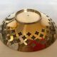 Lattice brass catchall and candlestick.