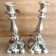 Paire de bougeoirs flambeaux en argent massif poinçon licorne, début XIXème