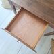 Old farmhouse side table in country style