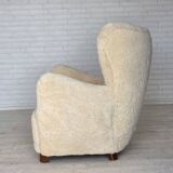 1960s, Danish armchair, genuine sheepskin "Canberra", reupholstered.