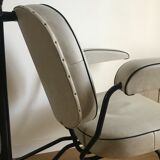 Vintage hairdresser's armchair with helmet transformed into a lamp