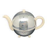Ceramic and metal teapot with felt insulation