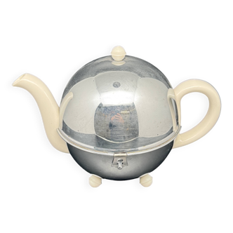 Ceramic and metal teapot with felt insulation