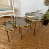Brass nesting tables and smoked glass