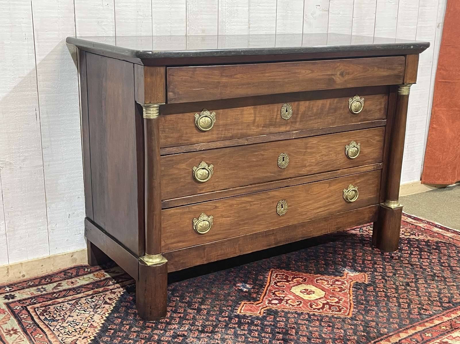 19th century Empire chest of drawers in cherry wood and black marble