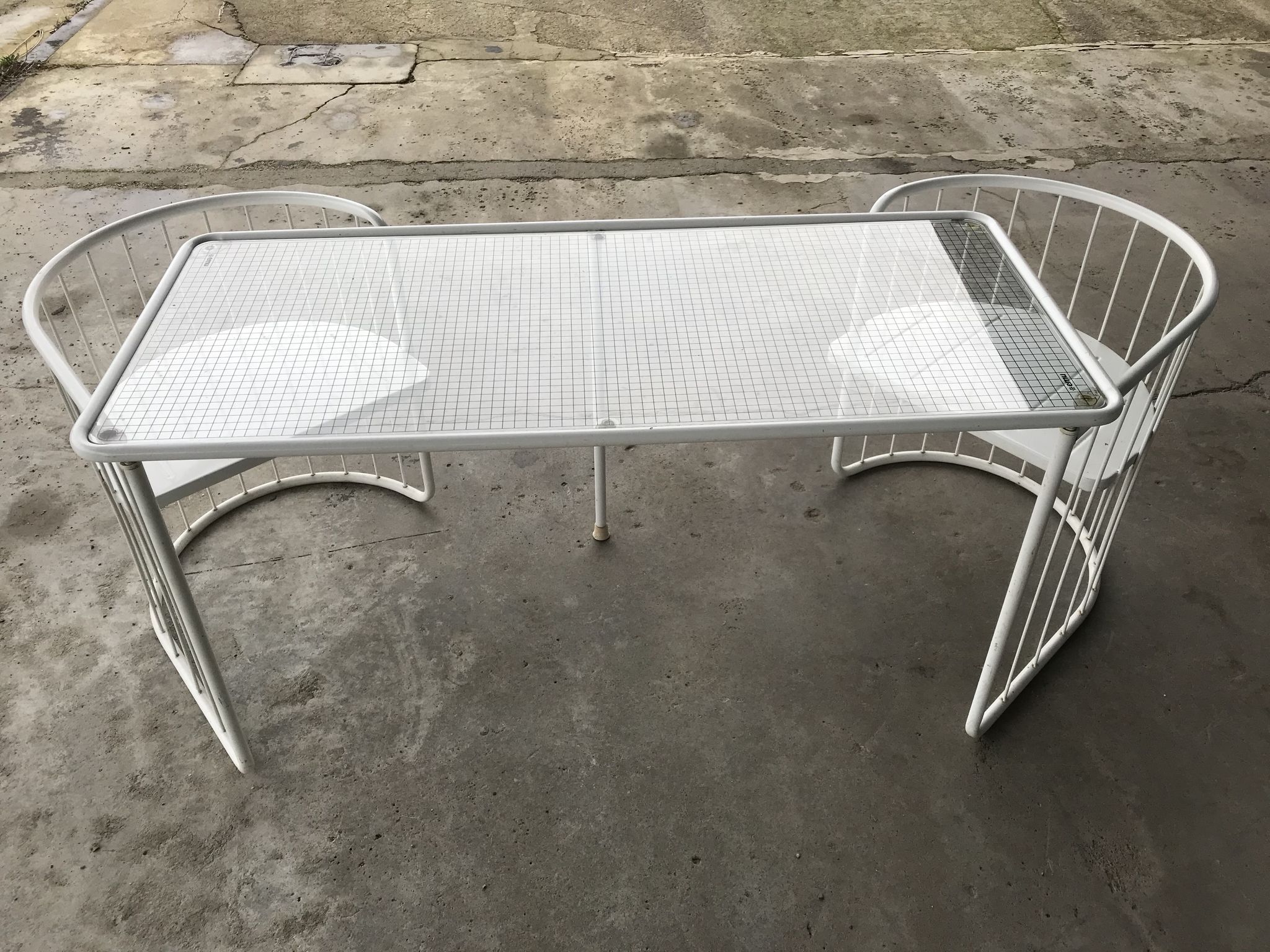 Vintage70's, Emu table in metal and glass, chairs swivelling under the table