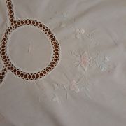 White tablecloth embroidered with lace & days