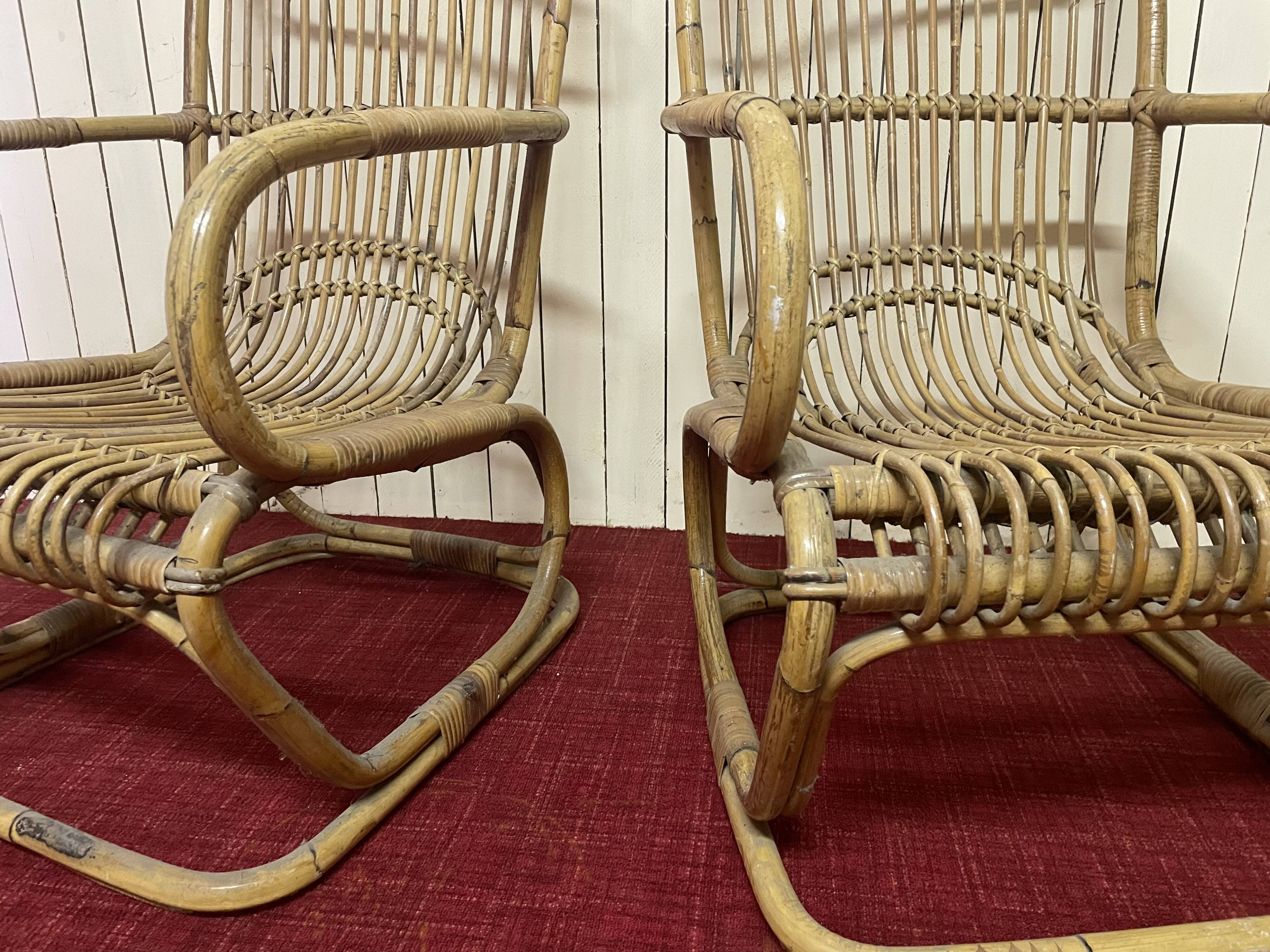 Pair of vintage rattan armchairs, Italy 1950