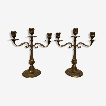 Pair of 3-pointed golden candlesticks