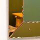 Striking French amber-coloured mirror with sculpted edge details, 1940s