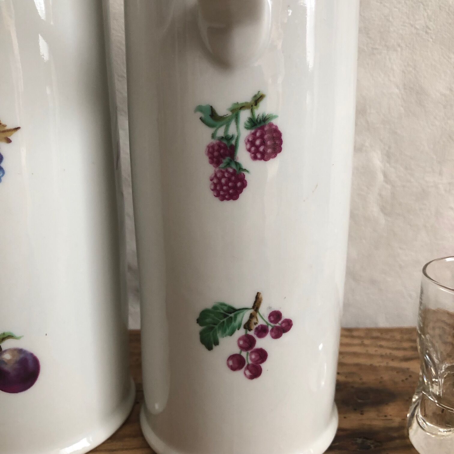 Porcelain bottle duo for mirabelle and raspberry brandy