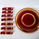 set of trivets, bottle coasters and knife holders in art de cherry-colored ceramic