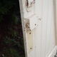 Old door in cream lacquered wood