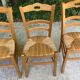 4 solid wood chairs in blond oak and straw shell