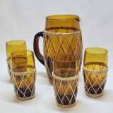 Vintage orangeade service in amber blown glass and wicker