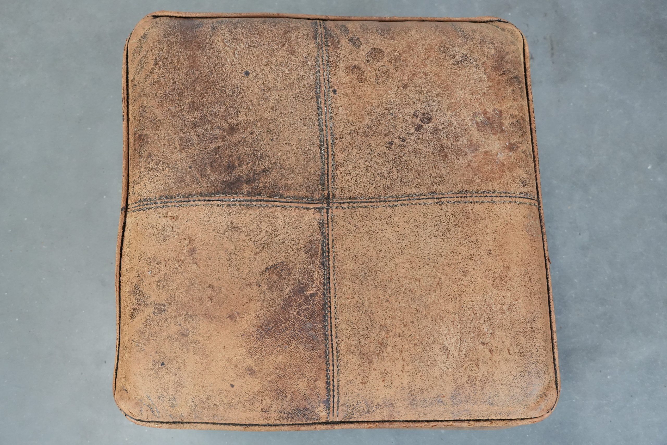 Sturdy square vintage sheepskin pouf/ottoman with beautiful colours