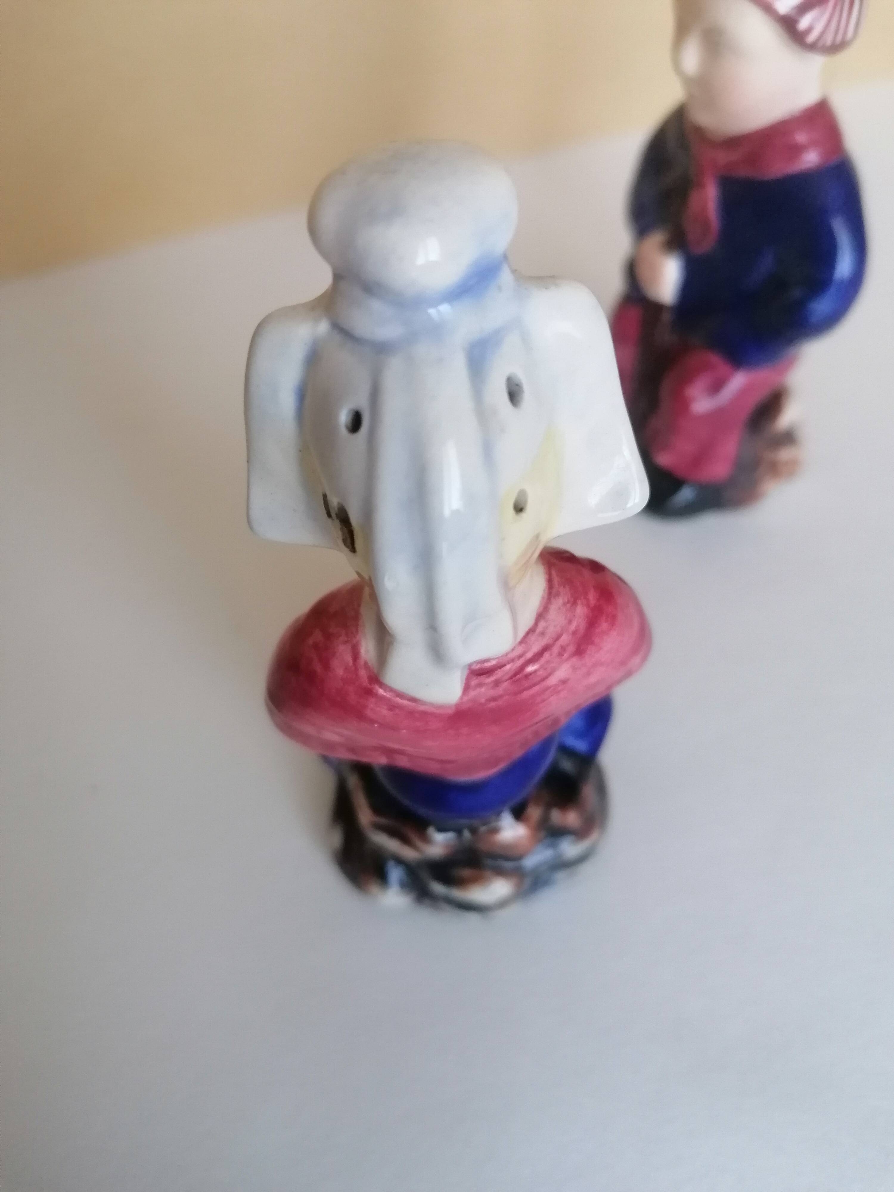 Breton salt and pepper shakers in a couple.