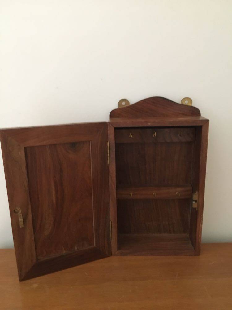 Key box in wood and brass and central motif representing a sailor's anchor