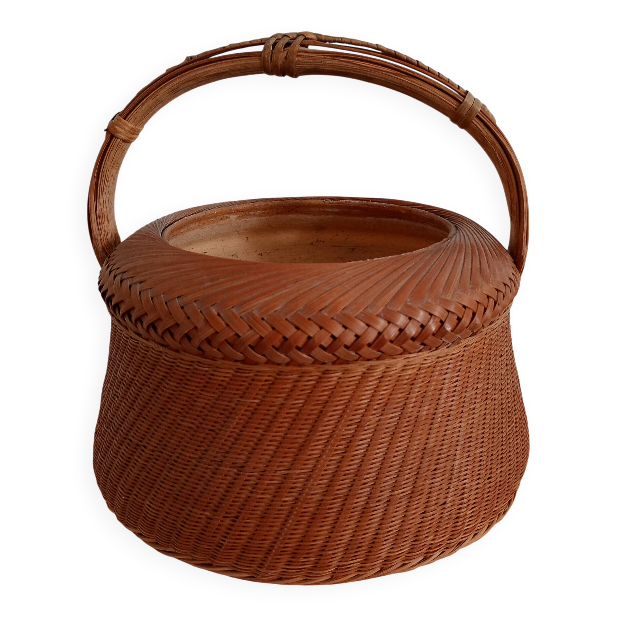 Woven bamboo basket and ceramic. Philippines.