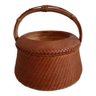 Woven bamboo basket and ceramic. Philippines.