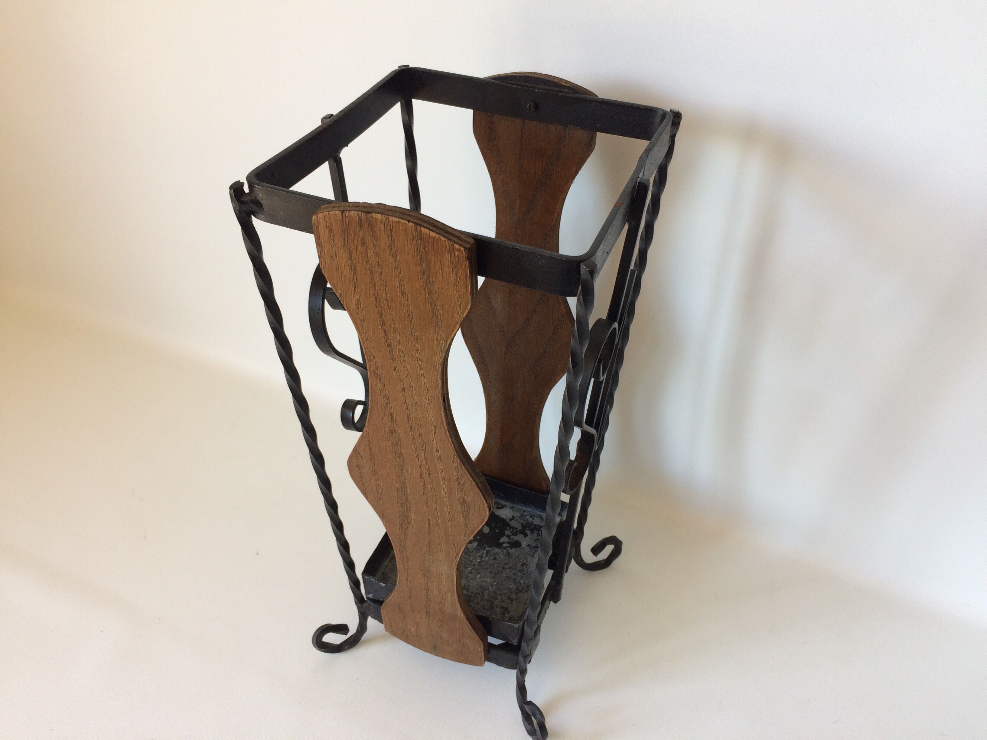 Umbrella holders wrought iron and dark wood