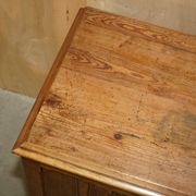 Antique Victorian pine governess buffet with sliding shelf.