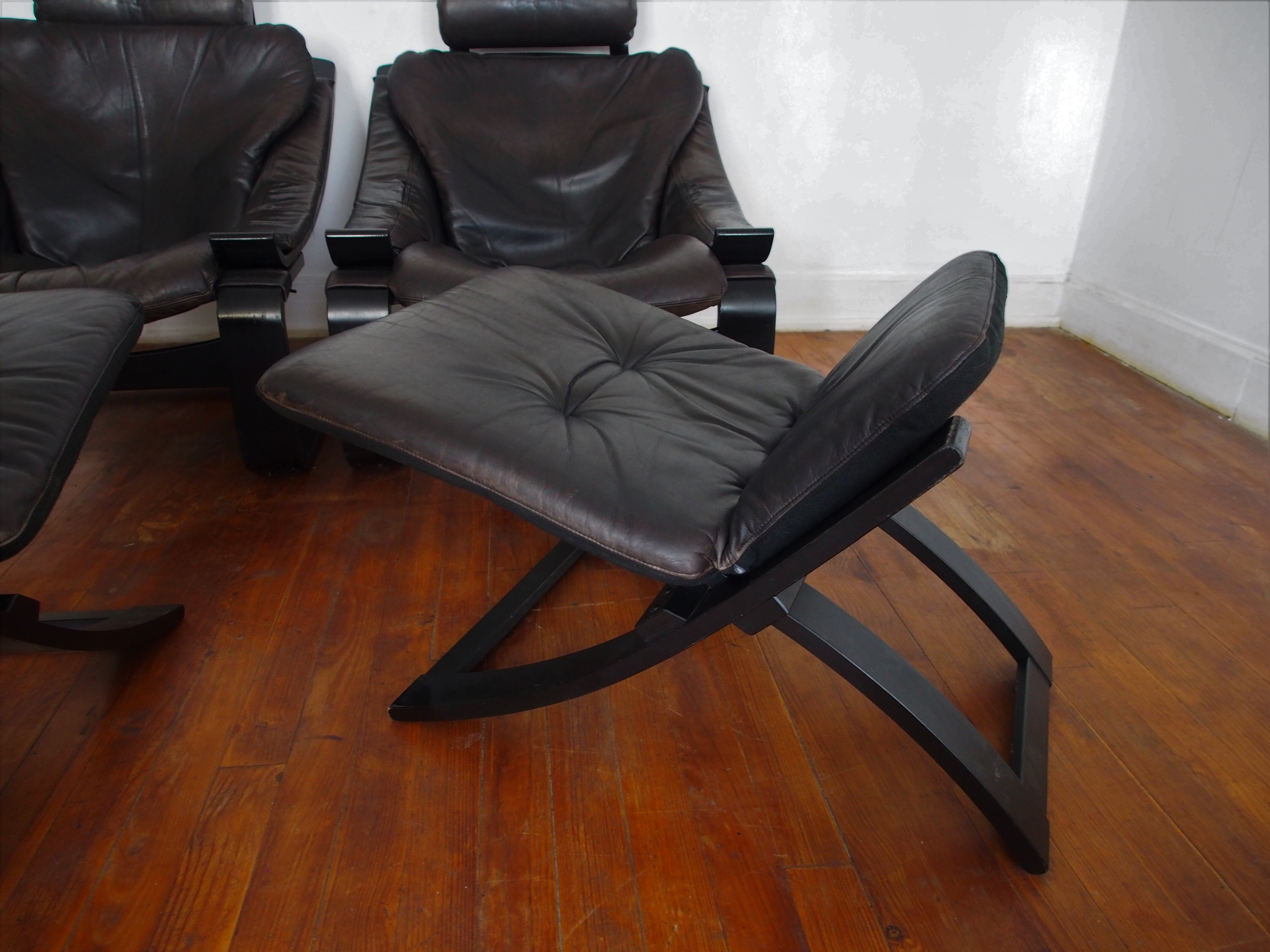 Pair of Scandinavian armchairs and footrests