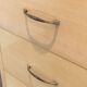 Eggshell lacquered chest of drawers with brushed steel legs. In the style of Knoll.