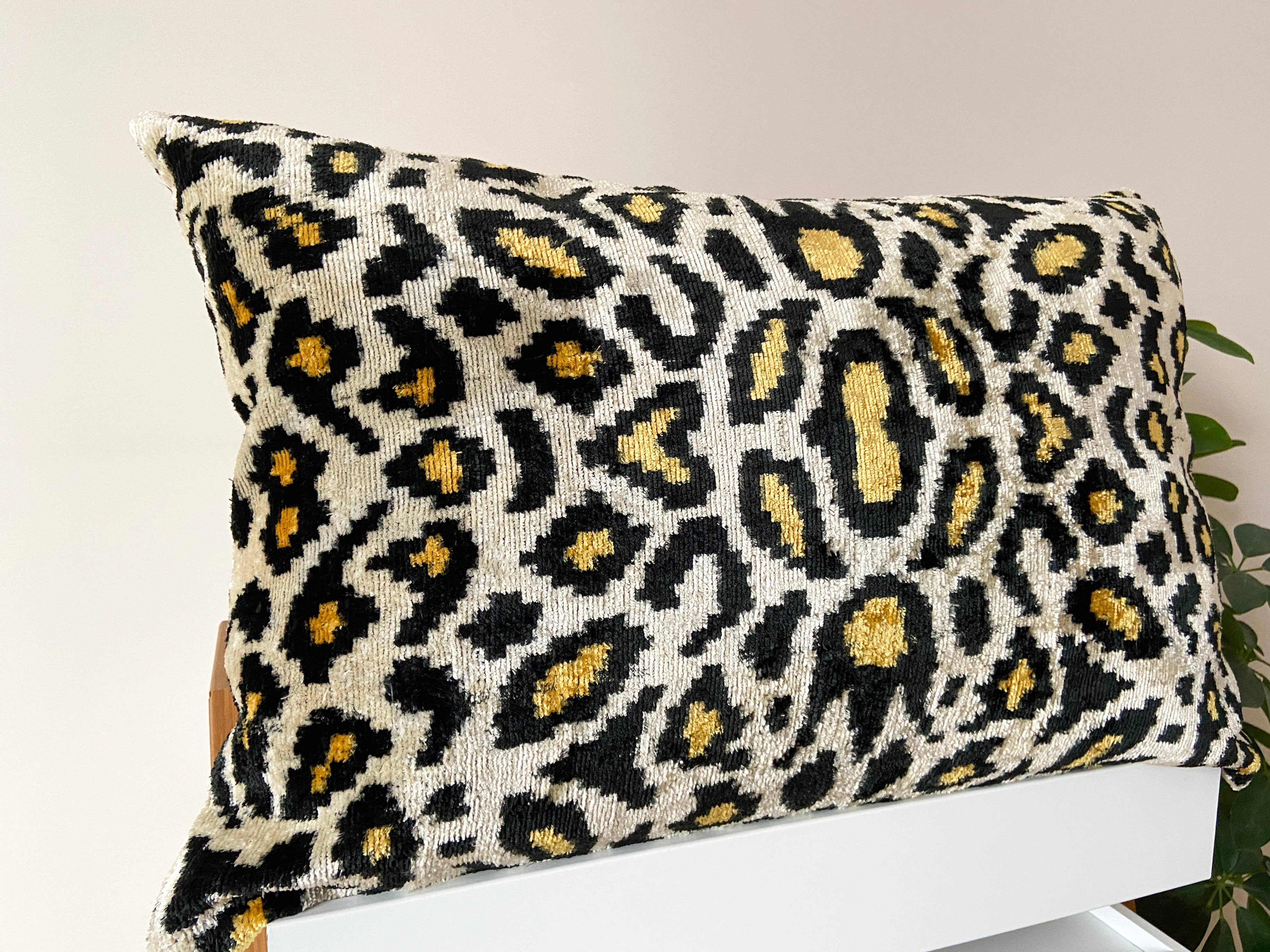 Ikat cushion in panther velvet