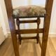 Antique chair with upholstered fabric seat