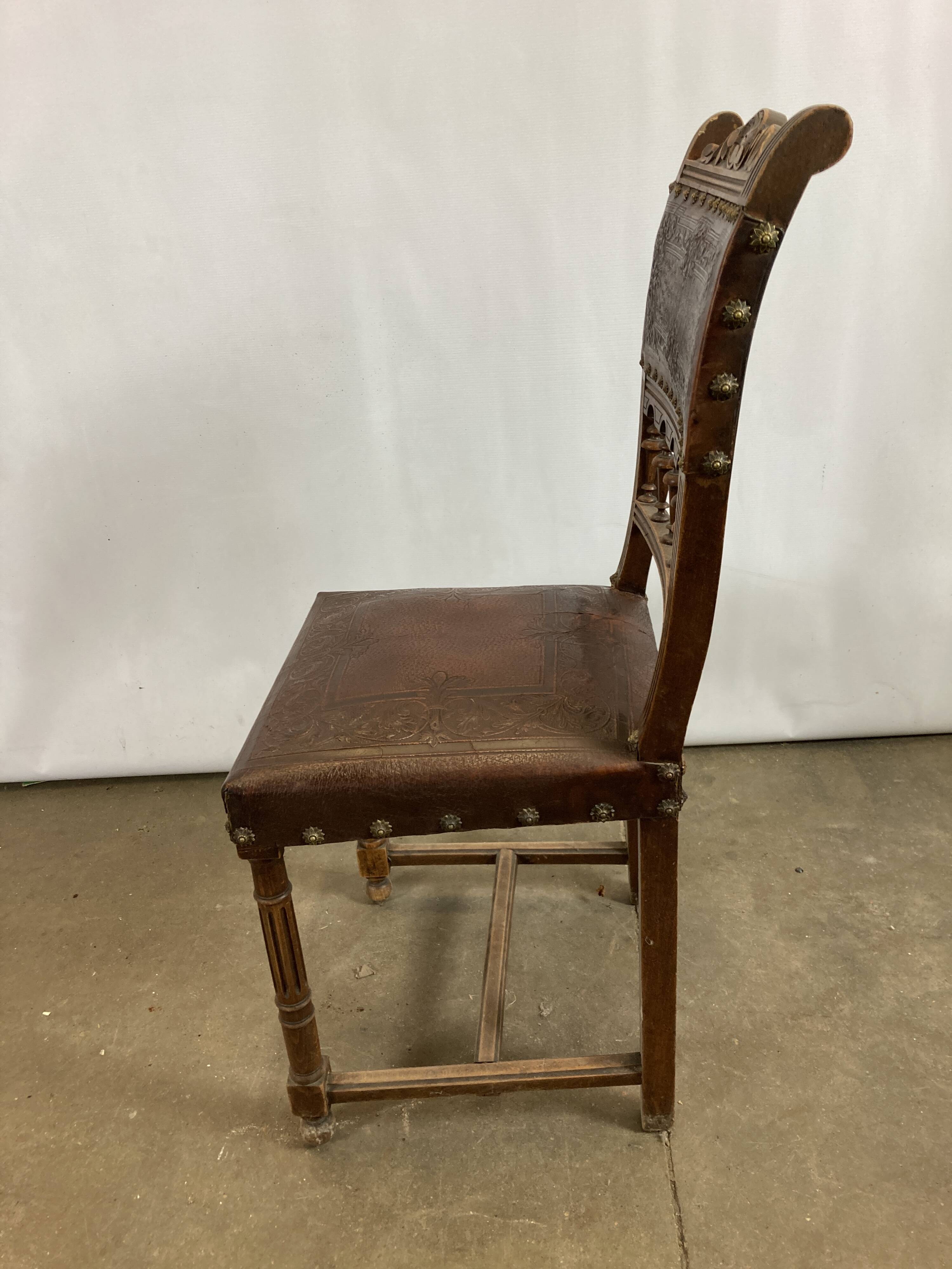 Pair of Henry II wooden and leather chairs