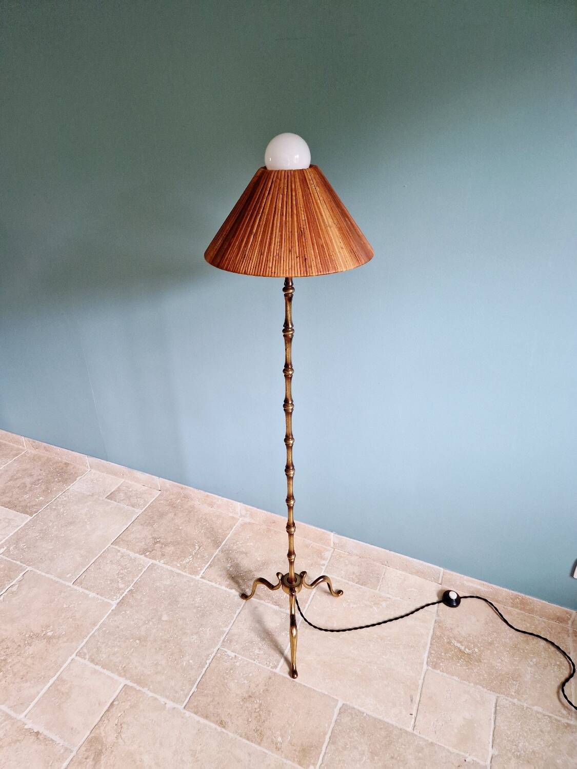 Brass floor lamp with rattan shade, 1950s-60s.