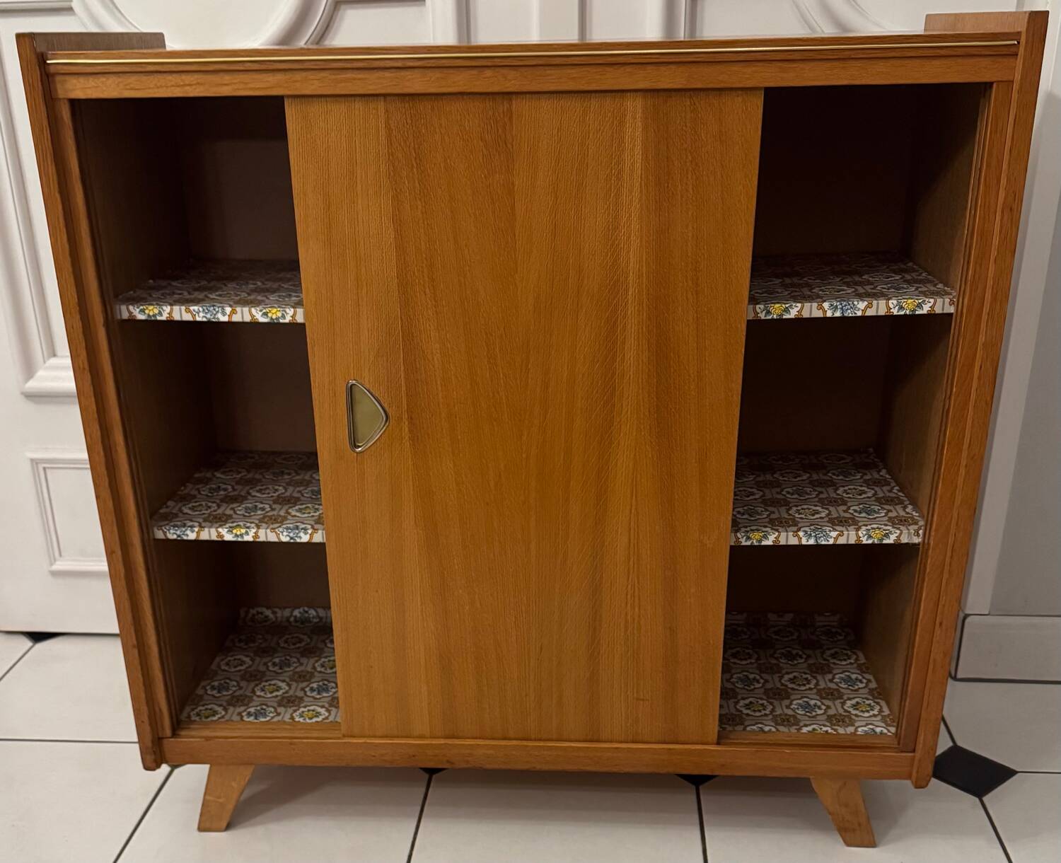 Vintage shoe cabinet with compass legs