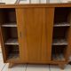 Vintage shoe cabinet with compass legs