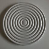 White glazed earthenware potter's trivet