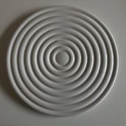 White glazed earthenware potter's trivet