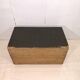 Large travel trunk in blackened wood