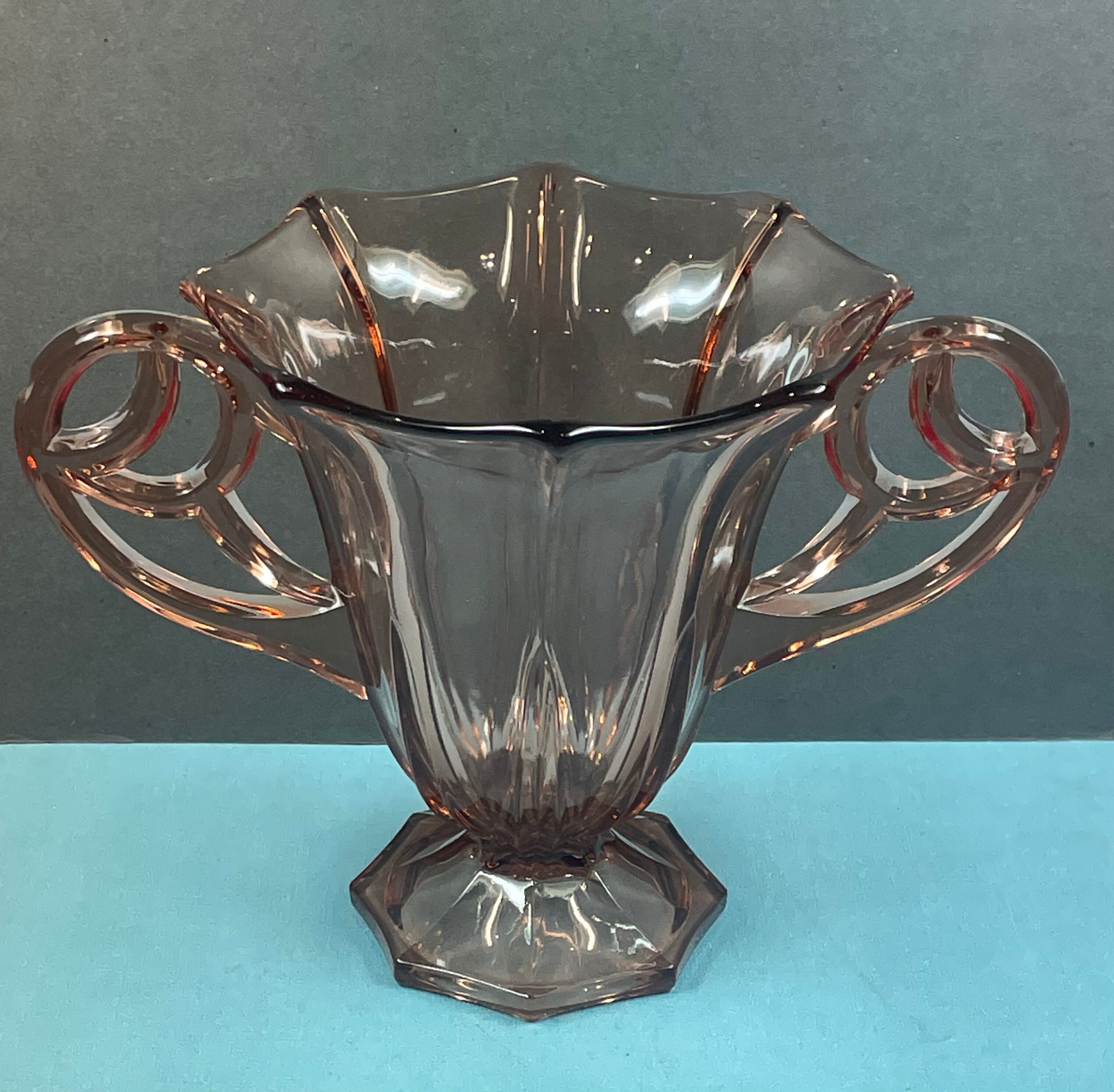 Old vase pink glass style cup with handles