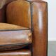 Set of 2 characterful, comfortable armchairs made of sheepskin leather with a sleek Art Deco design