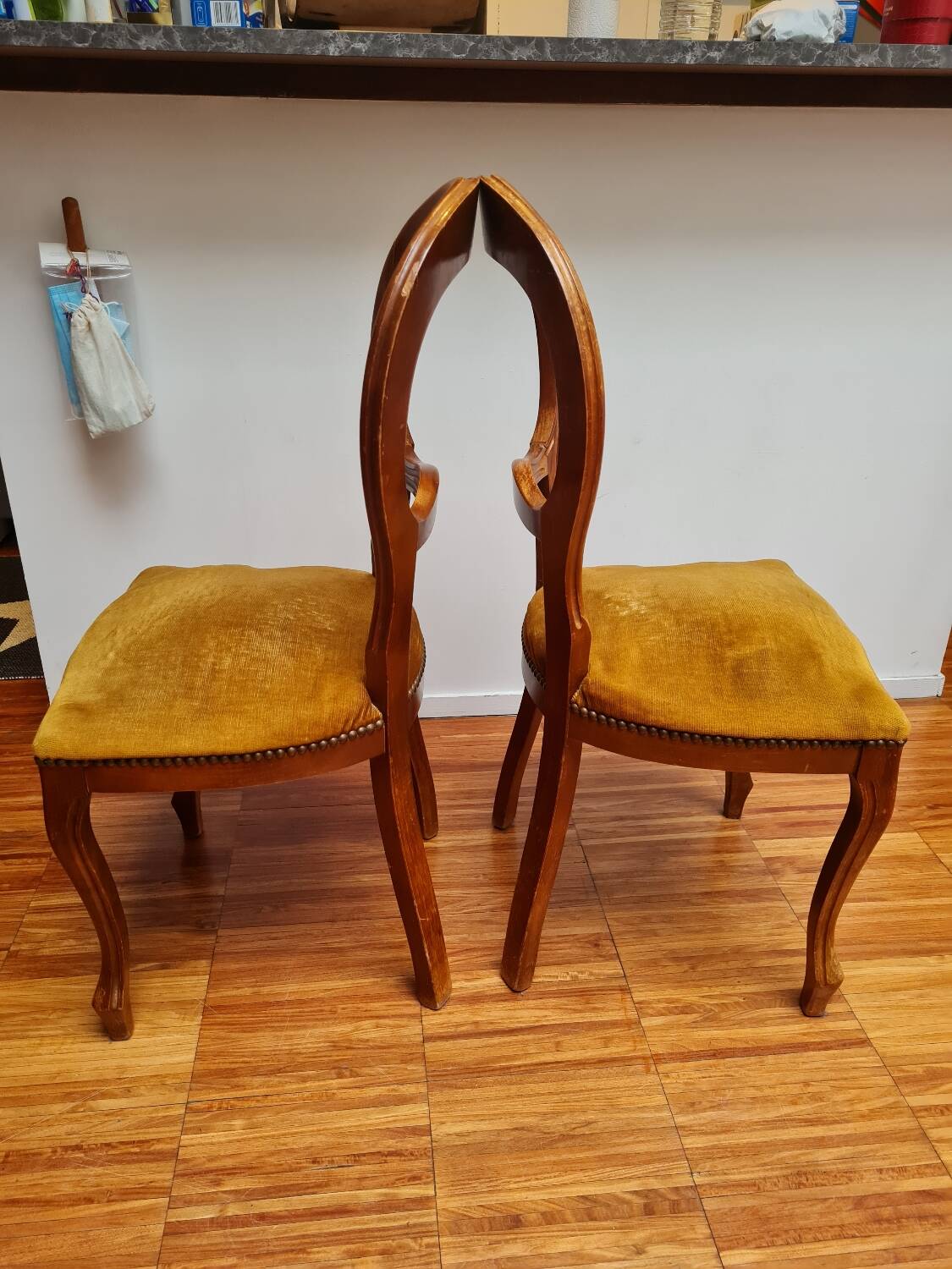 Pair of wooden chairs with velvet seats