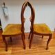 Pair of wooden chairs with velvet seats