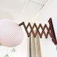 Scandinavian teak accordion wall lamp – 1960s cocoon shade