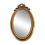 Miroir ovale à noeud doré  en bois