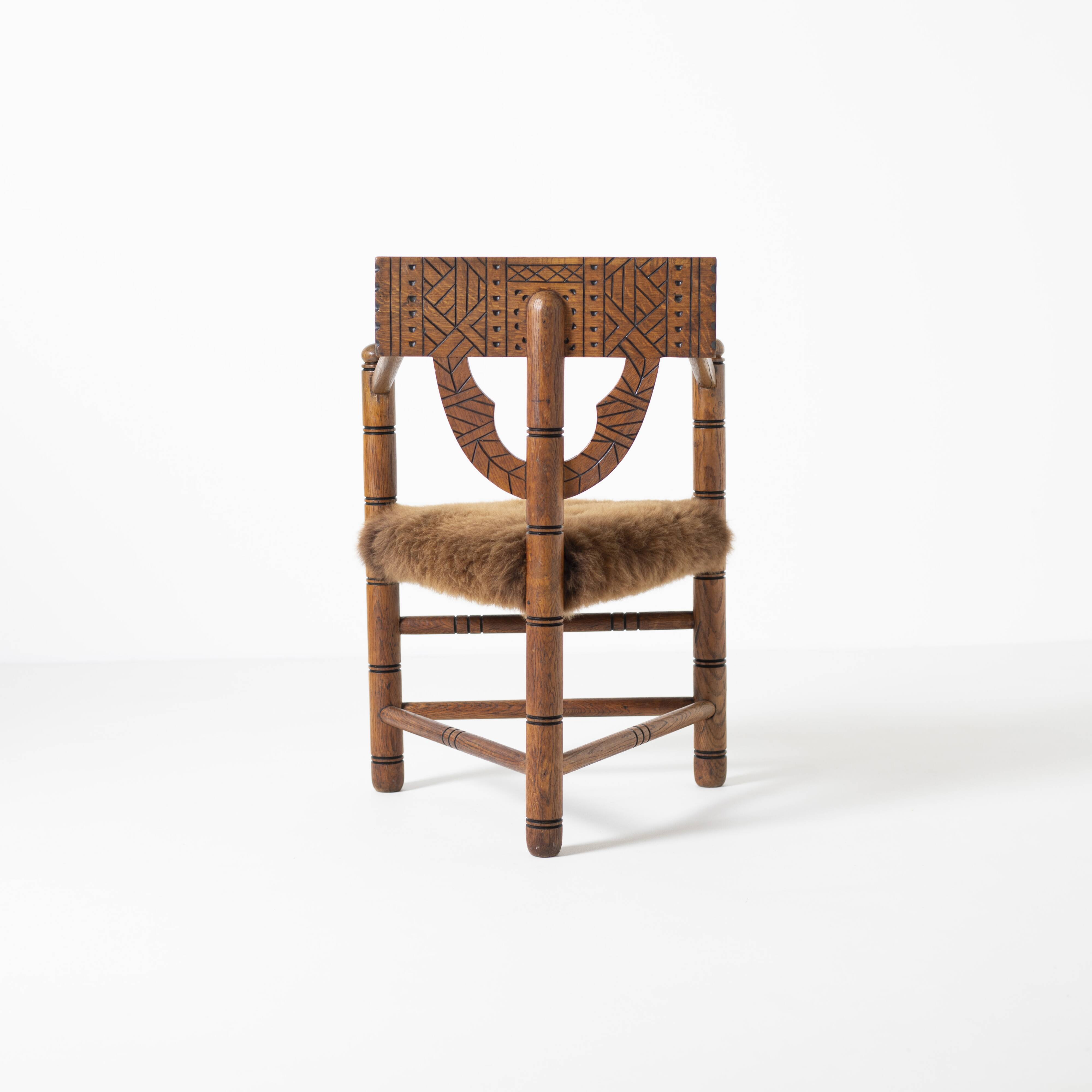 Hand carved brutalist  / folk 'Monk' chair, reupholstered in sheepskin, Swe