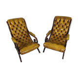 Pair of padded Chesterfield armchairs