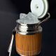 Hollywood Regency rattan ice bucket with tongs, Italy, 1970