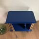 Small vintage upcycled side table in midnight blue and raw wood, with a rose-shaped door.
