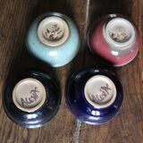 A set of 4 pottery bowls in coloured glaze.