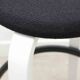 Alvar Aalto 64 stool upholstered in black and white for Artek.