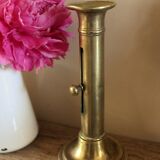 Push-button brass torch candle holder
